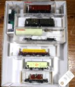 10 Fleischmann HO gauge Freight Wagons. 3x Low-sided wagons, one with load. Tank wagon BP, Well