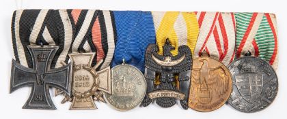 A WWI German medal group of six: 1914 Iron Cross 2nd Class, 1914-18 Honour Cross with swords, 9 year