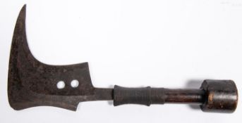 An African Mangbetu sickle knife, the plain iron blade pierced with two circular holes, the plain
