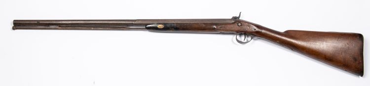 An 18 bore percussion sporting gun, converted from flintlock, 44" overall, half octagonal barrel