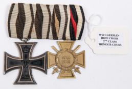 WWI German medal pair: 1914 Iron Cross 2nd class, and 1914-18 Honour Cross with swords, mounted on