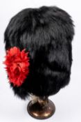 A good post 1902 officer's black bearskin cap of the Coldstream Guards, regimental red hackle,