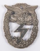 A Third Reich Luftwaffe Ground Combat badge, the clouds and lightning bolt showing traces of blue