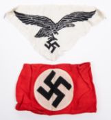 A Third Reich Luftwaffe sport vest woven cloth badge, 11" x 6"; and a linen party armband with