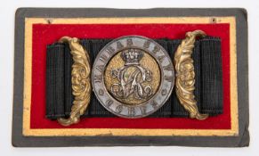 A Victorian officer's waist belt clasp of the Madras Staff Corps. GC, on its black brocade belt. £