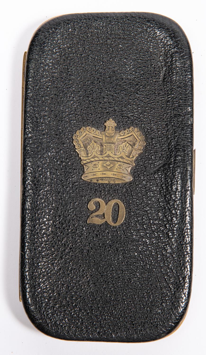 A gilt brass mounted leather card case, the front mounted with Victorian crown over "20". GC,