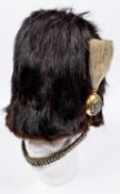 A fine and very scarce officer's Victorian racoon skin cap of the Yorkshire Dragoons Yeomanry,
