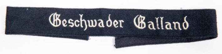 A black felt armband, embroidered in white Geschwader Gelland". GC £60-70