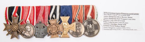 A WWI/WWII German/Austro Hungarian medal group: WWII War Merit Cross 2nd class with swords, Austro