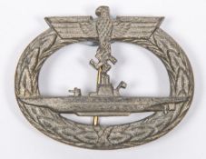 A Third Reich U boat War badge, with fretted out swastika, integral pin fittings, and "GWL" mark