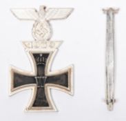 A 1914 Iron Cross 1st Class with integral 1939 bar, silver on grey metal. The original pin fitting