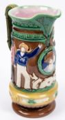 A Victorian majolica jug with military and naval themed embossed figures, height 10½". VGC £40-50