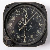 A small WWII US Naval 8 day clock, made by Waltham Watch Co, black dial with luminous markings,