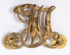 A gilt entwined "MT" pouch badge of the Military Train, 1856-1869. GC £40-60