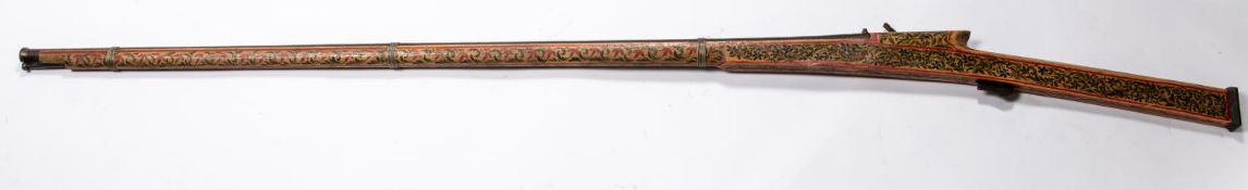 An Indian "tourist" quality matchlock gun, Torador, round barrel 45", the stock painted for its