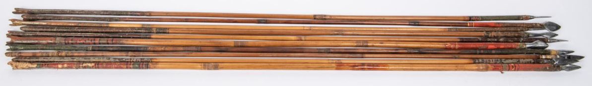 Ten 18th century Indian arrows, mostly with small leaf shaped heads, cane shafts, a few with