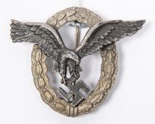 A Third Reich Luftwaffe Pilot's badge, with matt silver wreath and black eagle, the reverse with