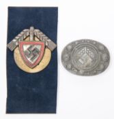 A Third Reich RAD enlisted man's cap badge, with two bend over blades, and an RAD Female's grey