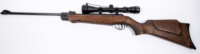 A .22" Webley Hawk Mark I air rifle, number 6220, with unvarnished beech stock, fitted with Nikko