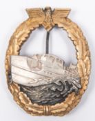 A Third Reich first pattern E Boat War badge, of heavy white metal construction, with silver boat on