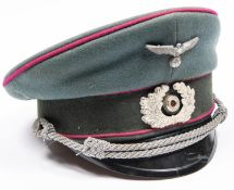 A Third Reich Smoke troops officers SD cap, army type metal insignia, crimson piping. GC £300-320