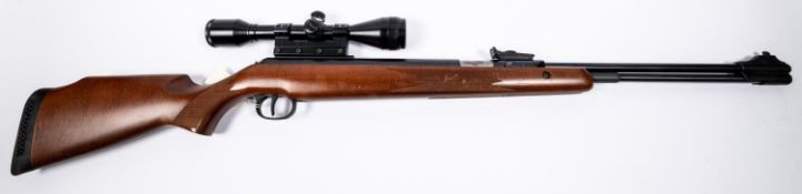 A good .22" Diana Model 460 underlever air rifle, number 01369617, with adjustable fore sight, beech