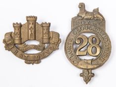 A pre 1881 glengarry badge of the 28th (North Gloucestershire) Regiment; and a brass glengarry badge