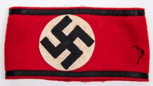 A Third Reich SS armband, of cotton lined felt with applied swastika and black bands, with woven RZM