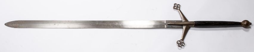 A good quality 19th century replica of a double handed mediaeval sword, 41" blade with makers marks,