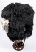 A fine Victorian officer's black bearskin cap of the Royal Fusiliers, gilt, silvered and enamelled