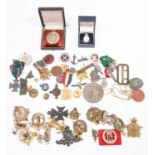 Twelve military cap badges, including 12th Lancers (2), KC Christian Chaplain silver, gilt and