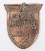 A Third Reich 1943 Kuban Shield, with copper washed finish, 4 band over blades, and steel backing