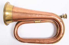 A brass mounted copper bugle, by Butler, Haymarket London & Dublin, stamped with the initials "G.H.