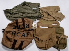 A webbing waistbelt and gaiters, 2 packs, a pair of khaki shorts and a combat jacket. GC £30-40