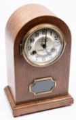 A Third Reich oak mantle clock, the face marked "XL Olympische Spiele Berlin 1936" and the 5
