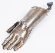 A good quality reproduction armour gauntlet, constructed of riveted steel with articulated