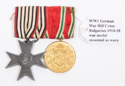 WWI medal pair: Prussian Kriegshilfe cross, and Bulgarian 1914-18 gilt war medal, mounted on bar