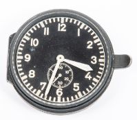 A German aircraft clock, 2¾" diameter, black dial with luminous hands and figures and small