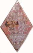 A large diamond shaped cast iron South East and Chatham Railway bridge weight limit sign. Red