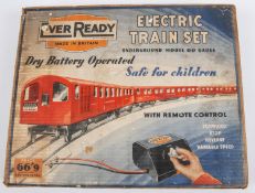 An Ever Ready London Underground Electric Train Set. Comprising; a 1938 stock 3-rail powered driving