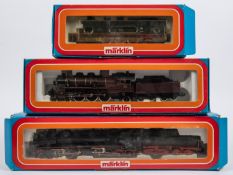 3x Marklin HO gauge 3-rail steam locomotives. A 2-6-8-0 loco with bogie tender (3102), 53 0001, in