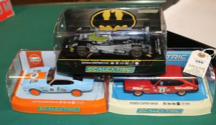 3x new issue Scalextric Racing cars. A Batman Inspired Car (le Mans style racer). A Ford Capri