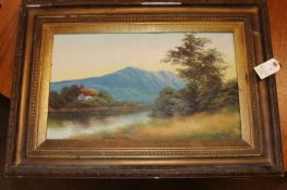 A pair of 19th century oil paintings on board. Both landscape scenes with blue mountains in the