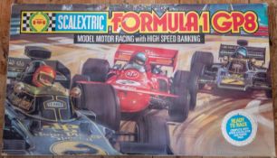 A large quantity of Scalextric with boxed sets and accessories. Including 3x sets; a Formula 1 GP8