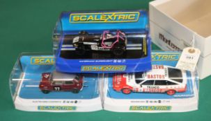 3x new issue Scalextric cars. Rover SD1 RN 8, red/white BASTOS/TEXACO livery. An Austin Mini