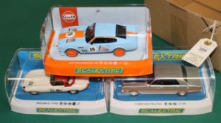 3x new issue Scalextric cars. Ford XW Falcon. In silver with orange stripe and black bonnet. An