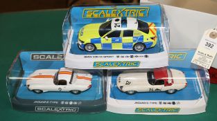 3x new issue Scalextric cars. A BMW 330i M-Sport POLICE Car. In blue and yellow livery. Plus 2x