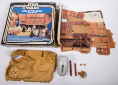 Kenner Land of the Jawa playset dating from 1978. Comprising of a moulded plastic playbase with card