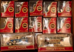 102x Matchbox Models of Yesteryear in maroon boxes, purple & yellow boxes and woodgrain boxes.