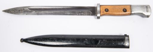 A WWII German K98 bayonet, the blade numbered 2965 and with maker's date code "43asw", the hilt with